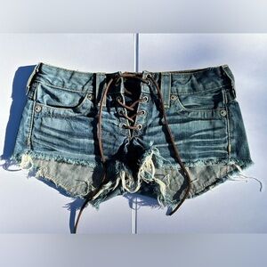 TRUE RELIGION Low Rise Lace Up Frayed Denim Shorts Size 24